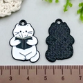 Detail of cute cat enamel charms showing front white design and back metal texture - 25*17mm / Cat Sitting on Book