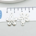 Polished silver alloy five-petal flower pendant showing front and textured back details - Hollow Flower (20454)