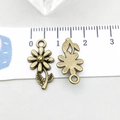 Antique bronze flower pendant showing front and back textures with measurement - Flower (20493)