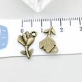 Antique bronze alloy rose and leaf charms for DIY necklaces, measured on a ruler - Rose (20495)
