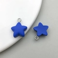 Detail of dark blue matte resin star pendants with silver metal rings for DIY jewelry - Sapphire Blue