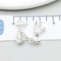 Silver alloy dog charms with spotted texture for DIY bracelet and jewelry making - Bright Silver Spotted Sitting Dog (20539)