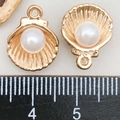 Detailed macro view of rose gold shell pendants with pearls and measurement ruler - Pearl Shell Pendant (11948) / 12*15mm