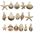 15pcs set of golden ocean themed charms with starfish and shells for DIY jewelry making - Mixed Ocean Series Styles (SN944)