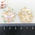 Macro shot of colorful enamel butterfly wreath pendant with rhinestones and gold alloy base - Pink Enamel Rhinestone Butterfly Wreath (19610)