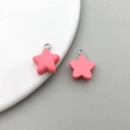 Two matte pink resin star pendants with silver metal loops for DIY jewelry making - Rose Red