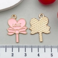 Detail view of heart lollipop charms with LOVE engraving and pink bow design - Enamel Bow (21116) / Pink