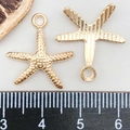 Golden starfish alloy charms for DIY jewelry making shown with a measurement scale - Starfish Pendant (16229) / 17*19mm