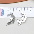 Macro detail of antique silver moon face alloy charm showing embossed texture and ring - Antique Silver Moon (5782)