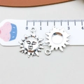 Vintage silver sun charms for DIY jewelry making with solar face and ray details - Antique Silver Smiling Sun (7701)