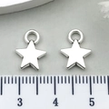Detailed view of silver star charms with ruler showing 1.2cm size for DIY jewelry - Pentagram Style (5812)