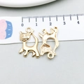 Golden cat-shaped alloy pendant charm for DIY jewelry making shown with size ruler - Agile Cat Style (20622)