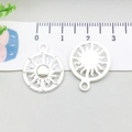 Macro detail of sun-shaped silver charms with hollow rays for DIY jewelry making - Bright Silver Sun (20838)