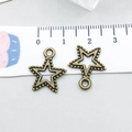 Vintage bronze star pendant charm with hollow design and textured edge, size 17mm - Antique Bronze Star (9069)
