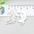 Silver alloy moon face charms for DIY jewelry making, showing front and back with scale - Bright Silver Moon (20847)