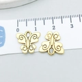 Pendentifs papillon dorés en alliage avec motifs spirales noirs sur une règle graduée - Papillon Or Antique (20180) / Or antique