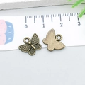 Pendentifs papillon en alliage bronze pour bijoux DIY avec ailes en relief - Papillon Bronze Antique (20155) / Bronze Antique