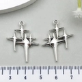 Set of two silver alloy star pendants with a pointed four-corner design for jewelry making - Elongated Star Style (18729)