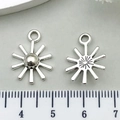 Silver sun alloy charm pendant for DIY jewelry, 20mm diameter showing both sides - Raised Sun Style (21507)