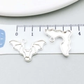 Macro shot of silver bat charms showing detailed wing textures for DIY jewelry making - Bat Style (20116) / 23x14mm