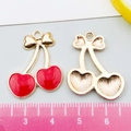 Pendentif cerise en émail avec nœud doré et finition rouge pour bijoux DIY - Cerise en Émail Rouge (12295)