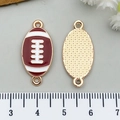Red enamel rugby ball charm pendant in alloy with golden textured back and rings - Enamel Rugby Style (21732) / Brown