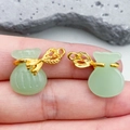 Light green faux jade money bag pendant with a golden bow and hollow metal base - Light Green Lampwork Money Bag (22206) / 21*16mm