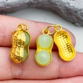 Green glass jade-style peanut pendant with golden metal shell for DIY jewelry - Light Green Lampwork Peanut (22208) / 37*8mm