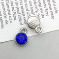 Detailed front and back view of silver alloy star pendant with deep blue crystal for DIY - Silver September Style (13501)