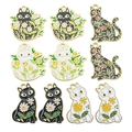 Golden alloy cat pendants with black and white enamel flowers in various poses - Mixed Color Style