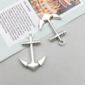Détail de deux pendentifs ancre marine argentés pour la création de bijoux DIY sur papier - Style d'ancre (3263) / 19*28mm