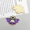 Cartoon cat charm with purple bat wings and pink crystal ball, front and back view - Bat-winged Cat