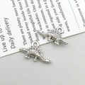 DIY jewelry charm featuring an antique silver alloy stegosaurus dinosaur pendant - Antique Silver Small Dinosaur Style (15765)