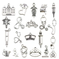 Antique silver medical charms set with stethoscope, nurse hat and hospital icons - Medical Theme Series Style