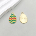 Green and pink wave pattern enamel Easter egg pendant charm with gold plated finish - Multicolor Wave Style