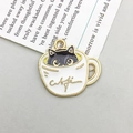 DIY charm featuring a cartoon black cat in a white coffee cup with gold trim and oil drop finish - Teacup Black Cat (16962) / 15*14mm
