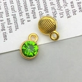 Antique gold alloy pendant with faceted green synthetic stone for DIY jewelry making - August - Peridot Green