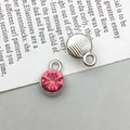 Silver alloy round pendant with rose red rhinestone and vertical textured back - Silver October Style (13502)