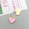 Pink enamel heart charm in golden alloy for DIY jewelry making with hole detail - Pink Enamel Sunburst Heart Style (15811)