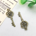 Antique bronze alloy rose key charm pendant for DIY vintage jewelry making - 11x27mm / Vintage Key Style (854)