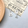 Pair of vintage silver alloy guitar key pendants with detailed antique carved textures - Antique Silver Guitar Style Five