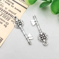Antique silver alloy key charms with hollow floral pattern and heart detail in retro style - 10x31mm / Vintage Key Style (6804)