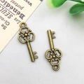 Vintage bronze alloy key charms with hollow floral pattern for DIY jewelry making - 23x9mm / Antique Bronze Vintage Key Style (6948)