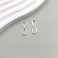 Poliertes Unendlichkeitssymbol-Anhänger-Ohrringe mit minimalistischem Geometriedesign - Minimalistischer Polierter Stil (2970)