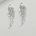 Antique silver wing alloy charms with intricate feather texture for DIY jewelry crafts - Antique Silver Small Wing Style (5009)
