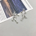 Antique silver alloy American football player pendant for DIY jewelry making - Antique Silver Athlete with Ball Charm