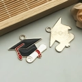 DIY graduation cap and scroll charms in gold alloy with enamel finish for jewelry making - Black Doctoral Cap Style (16521)