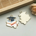 Handmade enamel graduation charm featuring a cap, books, and scroll for jewelry DIY - Dark Blue Cap and Scroll Style (18793)