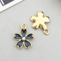 Golden cherry blossom flower pendant with dark grey enamel and central rhinestone - Black Enamel Rhinestone Cherry Blossom Style (11905)