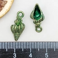 Macro shot of shell charm pendants with vintage green finish for DIY jewelry - Enamel Green Conch (8599)